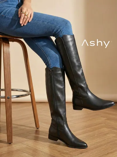 جزمة اسود طويلة جلد صناعي بكعب عريض